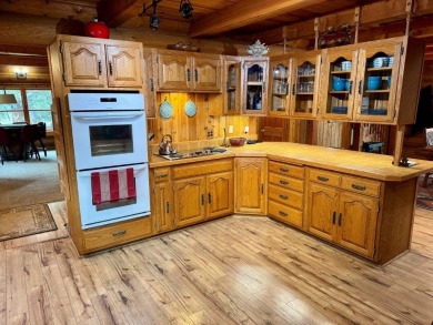 This Rocky Mountain Log Home has it all! Great value with this 2 on Double Arrow Lodge in Montana - for sale on GolfHomes.com, golf home, golf lot