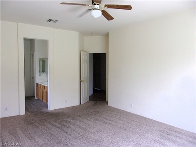 Corner lot in a 55+ golf course community with front sitting on Mojave Resort Golf Club in Nevada - for sale on GolfHomes.com, golf home, golf lot