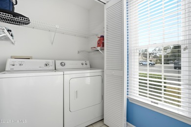 This inviting townhome located in The Woods section of Sea Trail on Sea Trail Golf Resort in North Carolina - for sale on GolfHomes.com, golf home, golf lot