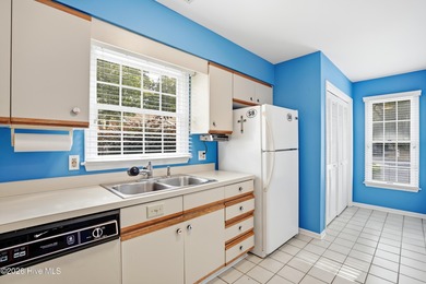 This inviting townhome located in The Woods section of Sea Trail on Sea Trail Golf Resort in North Carolina - for sale on GolfHomes.com, golf home, golf lot