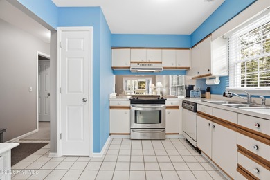 This inviting townhome located in The Woods section of Sea Trail on Sea Trail Golf Resort in North Carolina - for sale on GolfHomes.com, golf home, golf lot