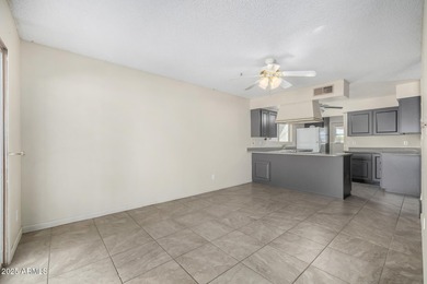 Located in the guard gated 55+ community of Fountain of the Sun on Fountain of the Sun Country Club in Arizona - for sale on GolfHomes.com, golf home, golf lot