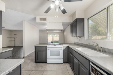 Located in the guard gated 55+ community of Fountain of the Sun on Fountain of the Sun Country Club in Arizona - for sale on GolfHomes.com, golf home, golf lot