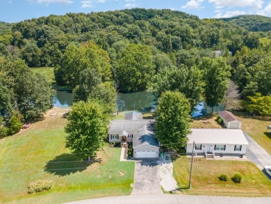 Welcome to your serene retreat in the prestigious Perry Park on Perry Park Golf Resort in Kentucky - for sale on GolfHomes.com, golf home, golf lot