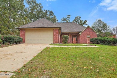 This immaculate 3-bedroom, 2-bathroom home boasts a spacious 1 on Castlewoods Golf Club in Mississippi - for sale on GolfHomes.com, golf home, golf lot