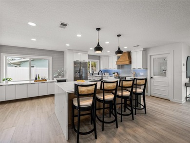 Like new coastal modern living in one of St. Petersburg's most on Pasadena Yacht and Country Club in Florida - for sale on GolfHomes.com, golf home, golf lot