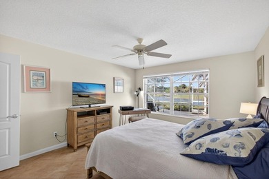 A brand-new metal roof & water views from the oversized lanai on The Florida Club in Florida - for sale on GolfHomes.com, golf home, golf lot