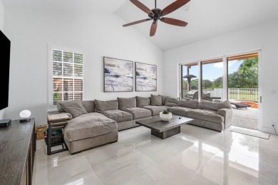 Spacious 5-bedroom, 4-bath, two-story home on a 1-acre lot in on PGA National Estates Golf Course in Florida - for sale on GolfHomes.com, golf home, golf lot