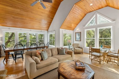 This 4BR, 3.5BA reverse floorplan tucked among mature oaks has on Bald Head Island Golf Club in North Carolina - for sale on GolfHomes.com, golf home, golf lot