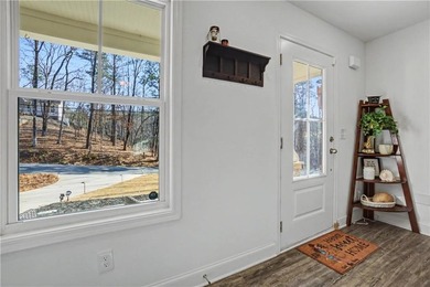 Enjoy peaceful living in this charming 2-bedroom, 2-bath home on The Highlands Course at Lake Arrowhead in Georgia - for sale on GolfHomes.com, golf home, golf lot