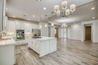 SPECTACULAR golf course views & maintenance-free luxury living on Jupiter Country Club in Florida - for sale on GolfHomes.com, golf home, golf lot