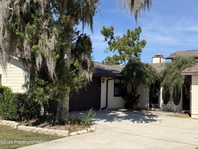 Unique 4-Bedroom Home on the Golf Course Of Ridge Manor Country on The Ridge Manor Oaks Golf and Country Club in Florida - for sale on GolfHomes.com, golf home, golf lot