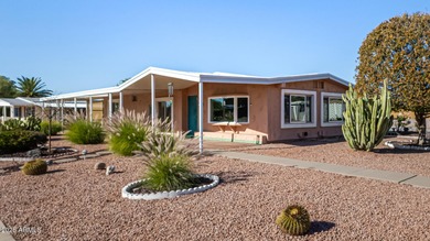 Great curb appeal to this corner lot 2 bed 2 bath furnished home on Fountain of the Sun Country Club in Arizona - for sale on GolfHomes.com, golf home, golf lot