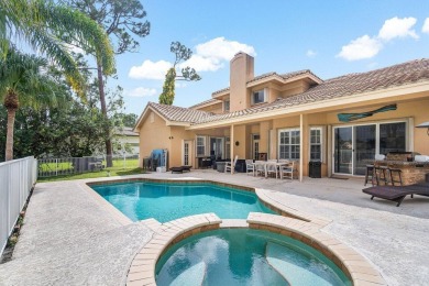 Spacious 5-bedroom, 4-bath, two-story home on a 1-acre lot in on PGA National Estates Golf Course in Florida - for sale on GolfHomes.com, golf home, golf lot