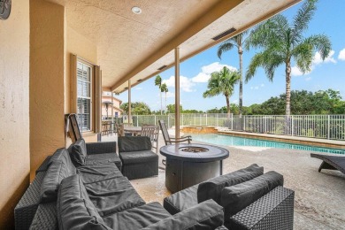 Spacious 5-bedroom, 4-bath, two-story home on a 1-acre lot in on PGA National Estates Golf Course in Florida - for sale on GolfHomes.com, golf home, golf lot