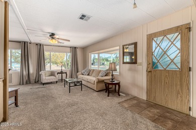 Great curb appeal to this corner lot 2 bed 2 bath furnished home on Fountain of the Sun Country Club in Arizona - for sale on GolfHomes.com, golf home, golf lot