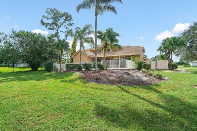 Spacious 5-bedroom, 4-bath, two-story home on a 1-acre lot in on PGA National Estates Golf Course in Florida - for sale on GolfHomes.com, golf home, golf lot