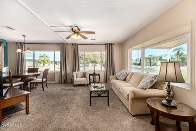 Great curb appeal to this corner lot 2 bed 2 bath furnished home on Fountain of the Sun Country Club in Arizona - for sale on GolfHomes.com, golf home, golf lot