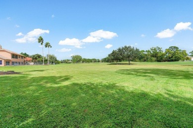 Spacious 5-bedroom, 4-bath, two-story home on a 1-acre lot in on PGA National Estates Golf Course in Florida - for sale on GolfHomes.com, golf home, golf lot