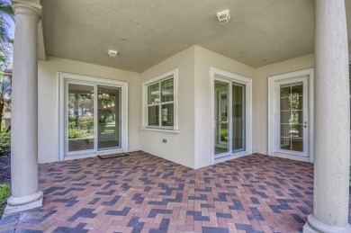 SPECTACULAR golf course views & maintenance-free luxury living on Jupiter Country Club in Florida - for sale on GolfHomes.com, golf home, golf lot