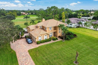 Spacious 5-bedroom, 4-bath, two-story home on a 1-acre lot in on PGA National Estates Golf Course in Florida - for sale on GolfHomes.com, golf home, golf lot