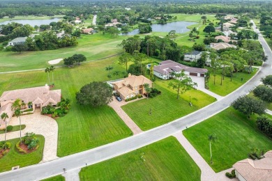 Spacious 5-bedroom, 4-bath, two-story home on a 1-acre lot in on PGA National Estates Golf Course in Florida - for sale on GolfHomes.com, golf home, golf lot