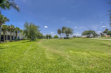 SPECTACULAR golf course views & maintenance-free luxury living on Jupiter Country Club in Florida - for sale on GolfHomes.com, golf home, golf lot