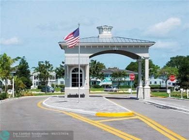 LOCATION! LOCATION!! THIS LOVELY HOME IS SITUATED DIRECTLY AROSS on Hillsboro Pines Golf in Florida - for sale on GolfHomes.com, golf home, golf lot