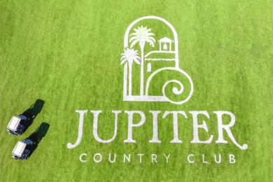 SPECTACULAR golf course views & maintenance-free luxury living on Jupiter Country Club in Florida - for sale on GolfHomes.com, golf home, golf lot
