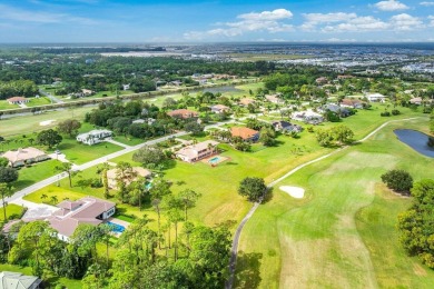 Spacious 5-bedroom, 4-bath, two-story home on a 1-acre lot in on PGA National Estates Golf Course in Florida - for sale on GolfHomes.com, golf home, golf lot