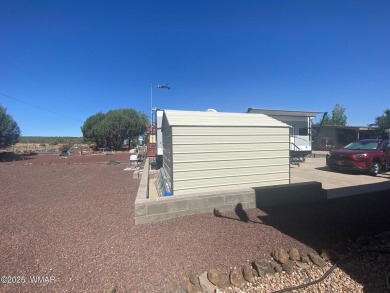 LOCATION LOCATION !!! This property is located with a view of on Juniper Ridge R.V. Golf Resort in Arizona - for sale on GolfHomes.com, golf home, golf lot
