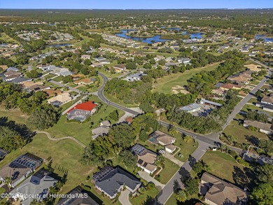 Discover this lovingly maintained home in the quiet, gorgeously on Glen Lakes Country Club in Florida - for sale on GolfHomes.com, golf home, golf lot
