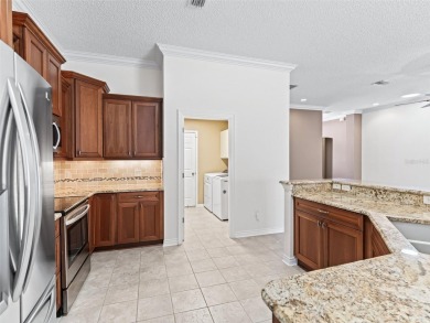 One or more photo(s) has been virtually staged. This inviting on Amberwood Executive Golf Course in Florida - for sale on GolfHomes.com, golf home, golf lot