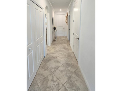 Live the Dream in this Birkdale Floorplan Condo with Stunning on Panther Run Golf Club in Florida - for sale on GolfHomes.com, golf home, golf lot