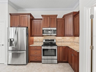 One or more photo(s) has been virtually staged. This inviting on Amberwood Executive Golf Course in Florida - for sale on GolfHomes.com, golf home, golf lot