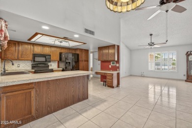 Check out this charming 2-bedroom, 2-bath split floorplan home on Westbrook Village Golf Club in Arizona - for sale on GolfHomes.com, golf home, golf lot