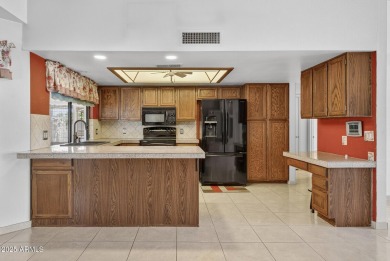 Check out this charming 2-bedroom, 2-bath split floorplan home on Westbrook Village Golf Club in Arizona - for sale on GolfHomes.com, golf home, golf lot
