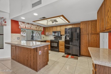 Check out this charming 2-bedroom, 2-bath split floorplan home on Westbrook Village Golf Club in Arizona - for sale on GolfHomes.com, golf home, golf lot