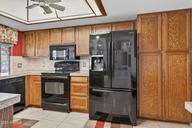 Check out this charming 2-bedroom, 2-bath split floorplan home on Westbrook Village Golf Club in Arizona - for sale on GolfHomes.com, golf home, golf lot