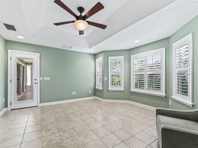 One or more photo(s) has been virtually staged. This inviting on Amberwood Executive Golf Course in Florida - for sale on GolfHomes.com, golf home, golf lot