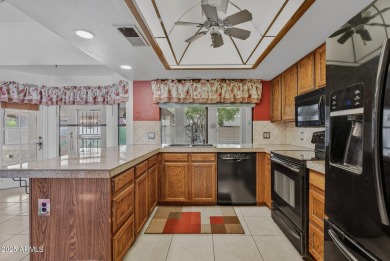 Check out this charming 2-bedroom, 2-bath split floorplan home on Westbrook Village Golf Club in Arizona - for sale on GolfHomes.com, golf home, golf lot