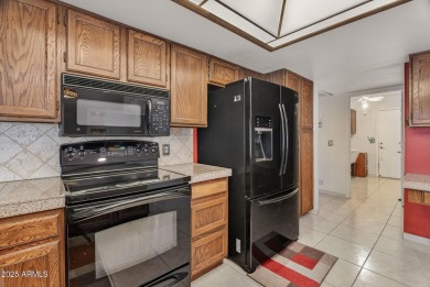Check out this charming 2-bedroom, 2-bath split floorplan home on Westbrook Village Golf Club in Arizona - for sale on GolfHomes.com, golf home, golf lot