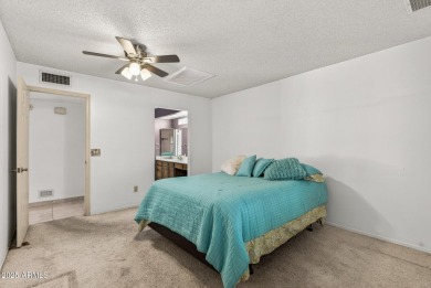Check out this charming 2-bedroom, 2-bath split floorplan home on Westbrook Village Golf Club in Arizona - for sale on GolfHomes.com, golf home, golf lot