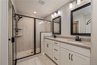 WELCOME TO CHAMPIONS POINTE and this QUALITY-BUILT, ONE-LEVEL on Champions Pointe Golf Course in Indiana - for sale on GolfHomes.com, golf home, golf lot