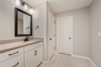 WELCOME TO CHAMPIONS POINTE and this QUALITY-BUILT, ONE-LEVEL on Champions Pointe Golf Course in Indiana - for sale on GolfHomes.com, golf home, golf lot