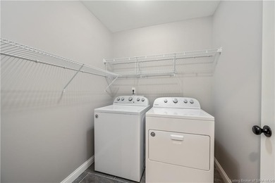 WELCOME TO CHAMPIONS POINTE and this QUALITY-BUILT, ONE-LEVEL on Champions Pointe Golf Course in Indiana - for sale on GolfHomes.com, golf home, golf lot