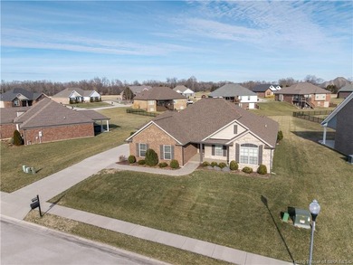 WELCOME TO CHAMPIONS POINTE and this QUALITY-BUILT, ONE-LEVEL on Champions Pointe Golf Course in Indiana - for sale on GolfHomes.com, golf home, golf lot
