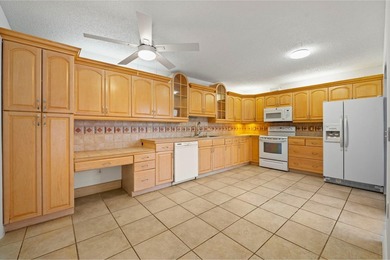 Located in a stunning golf course community with a friendly on Pine Island Ridge Country Club in Florida - for sale on GolfHomes.com, golf home, golf lot