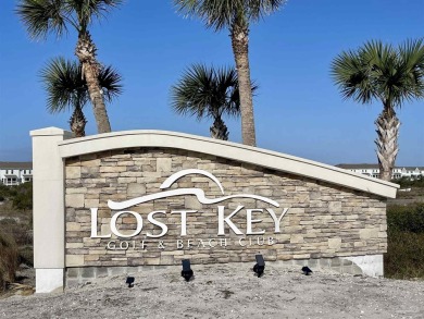 Experience resort-style living at its finest in this beautifully on Lost Key Golf Club in Florida - for sale on GolfHomes.com, golf home, golf lot