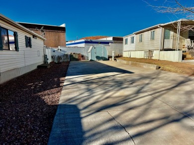 Check out this extra deep RV lot with a privacy wall in the back on Green Spring Country Club in Utah - for sale on GolfHomes.com, golf home, golf lot